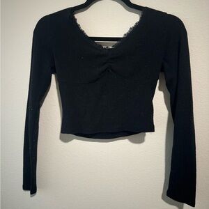 Black long sleeve crop top from Mixed Threads Los Angeles.
